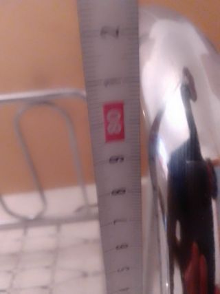 Cuna antigua de metal