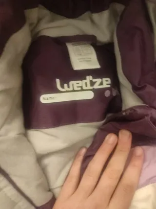 Mono de esquí morado