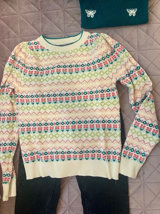 Jeans neri e maglioni