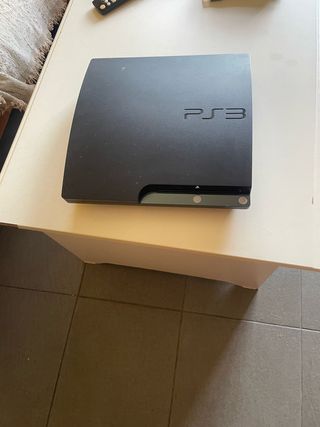 Cambio Consola PS3 Slim Negra muy completa