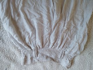 Pantalón ancho fluido crema