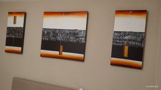 Cuadro moderno dormitorio naranja y blanco