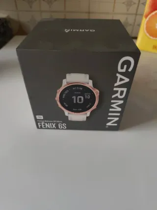 Reloj Garmin Dorado y Blanco