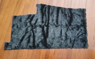 Tela de pelo sintético negro