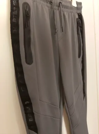 Tuta ragazzo/uomo grigia con zip