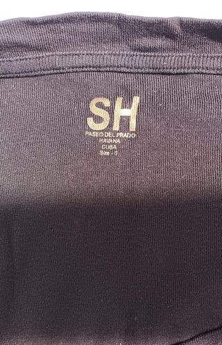 Blusa negra hombros caídos manga larga