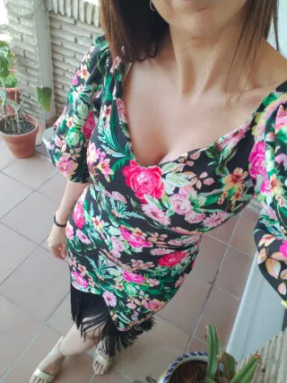 Vestido estampado con flecos y manga abullonada