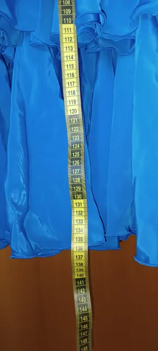 Traje de flamenca azul con volantes