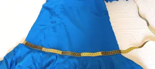 Traje de flamenca azul con volantes