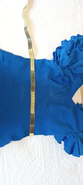 Traje de flamenca azul con volantes