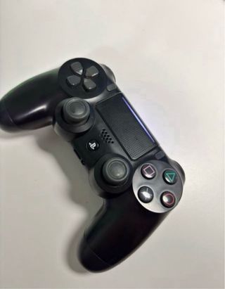 PS4 Slim Negra + 2 Mandos + FIFA 23+ 2 juegos