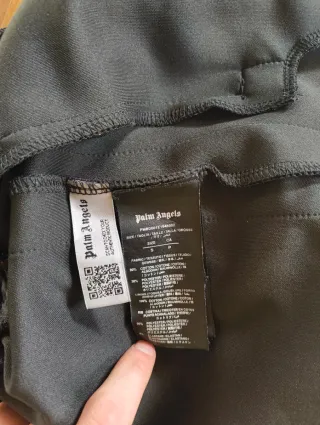 Shorts Palm Angels neri con strisce arcobaleno