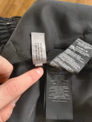 Shorts Palm Angels neri con strisce arcobaleno