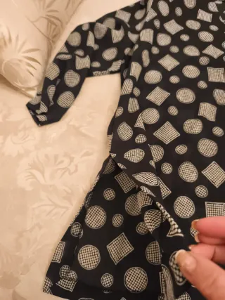 Traje de mujer negro y plateado