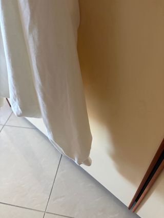 Maglia bianca con catena argento