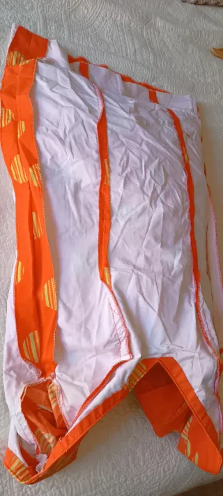 Traje de flamenca naranja y amarillo