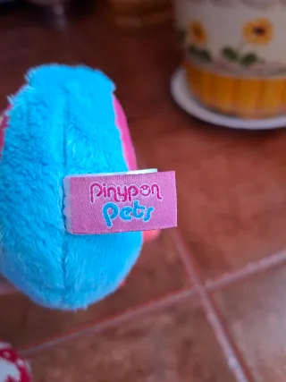 Peluche perro y caracol multicolor