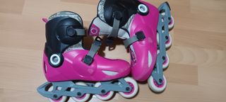 Patines en línea rosas y negros