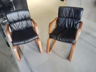 Poltrone in pelle e legno