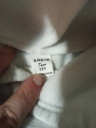 Sudadera niña beige con estrella dorada