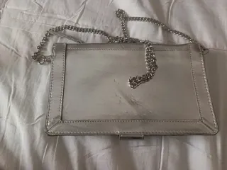 Bolso de mano plateado Stradivarius