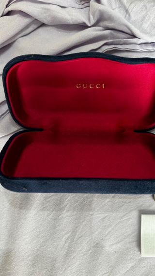 Occhiali Gucci neri e oro