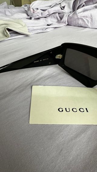 Occhiali Gucci neri e oro