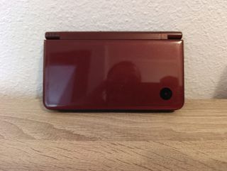 Nintendo DSi XL con funda y juegos