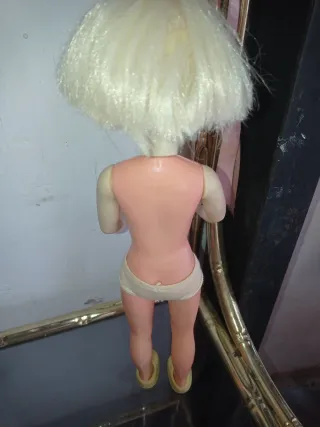 Muñeca antigua rubia ojos azules