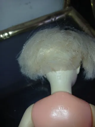 Muñeca antigua rubia ojos azules