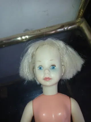 Muñeca antigua rubia ojos azules