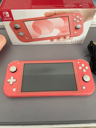Nintendo Switch Lite Coral + Accessori