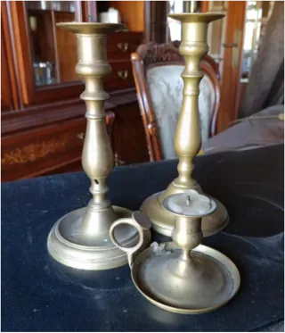 Candelabri in metallo dorati