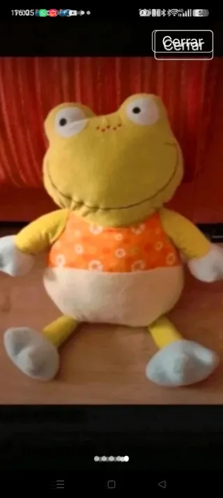 Peluche musical de rana para cuna