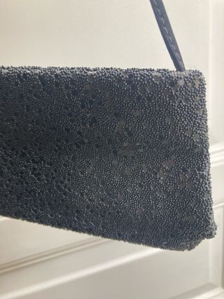 Pochette vintage nera con perline