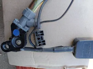 Pretensor de cinturón de seguridad