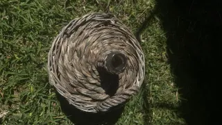 Damajuana di vetro con cesteria