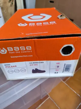 Zapatos de seguridad negros y verdes