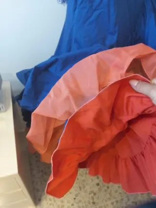 Traje de flamenca azul con flecos