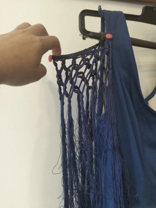 Traje de flamenca azul con flecos
