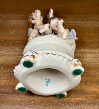 Pareja de querubines porcelana estilo Capodimonte