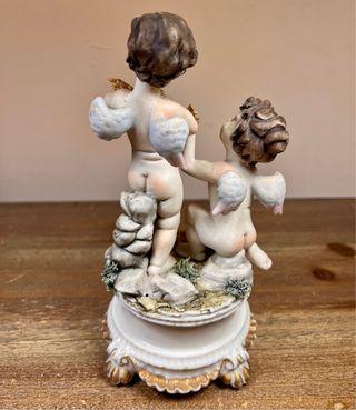 Pareja de querubines porcelana estilo Capodimonte