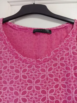 Camiseta rosa de Encuentro