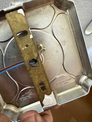 Lampada da parete in metallo argentato