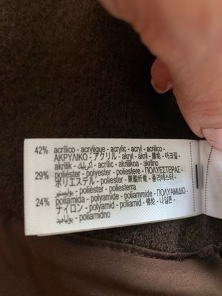 Cardigan punto con detalles pelo.