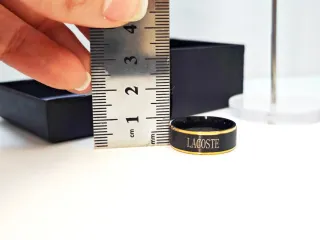 Anillo Lacoste Acero Negro y Dorado Talla 20.2 mm