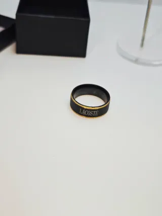 Anillo Lacoste Acero Negro y Dorado Talla 20.2 mm