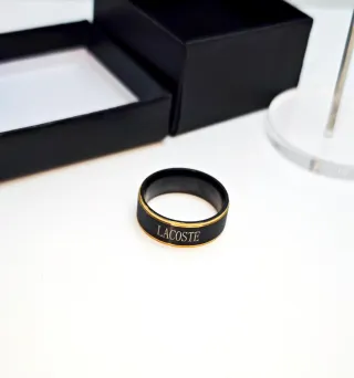 Anillo Lacoste Acero Negro y Dorado Talla 20.2 mm