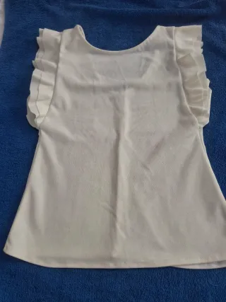 Blusa blanca T M. Medidas en descripción