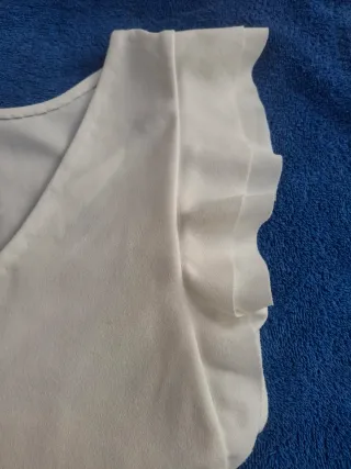 Blusa blanca T M. Medidas en descripción